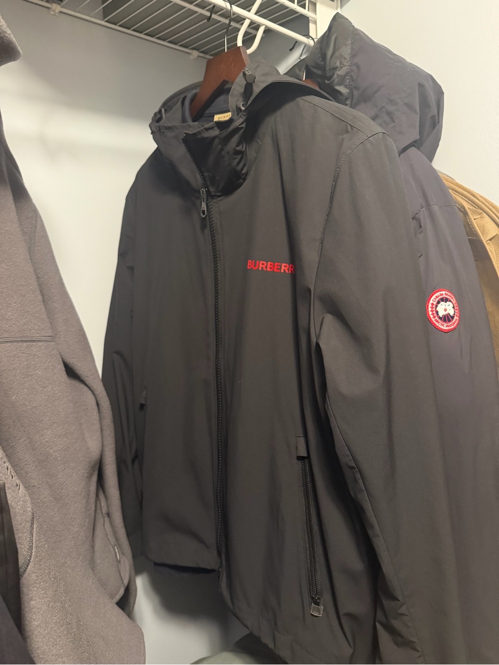 Burberry Black Hooded Raincoat with Red Logo Detail
